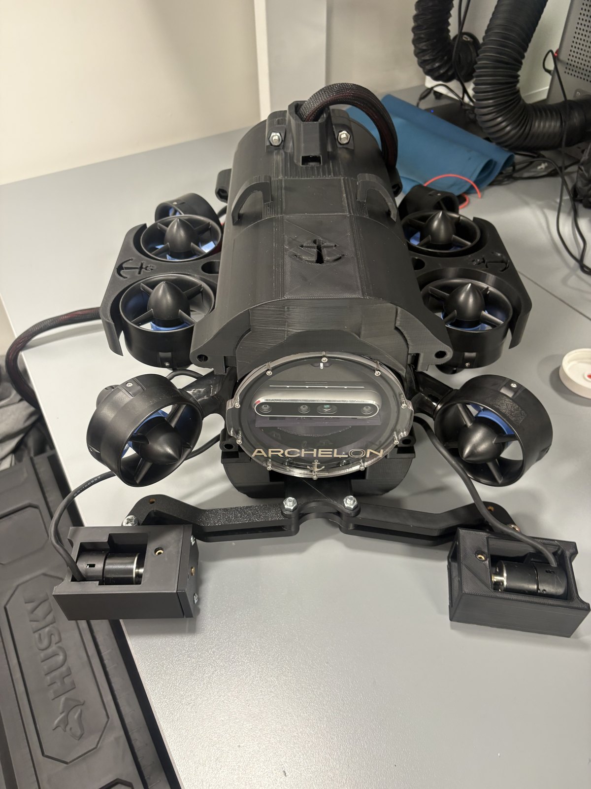 Archelon ROV on the bench showing four thruster nozzles and dome lights